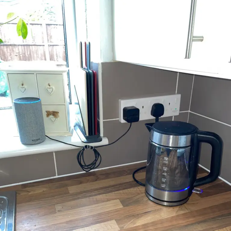 newly installed four section plug socket keeping appliance wires tidy