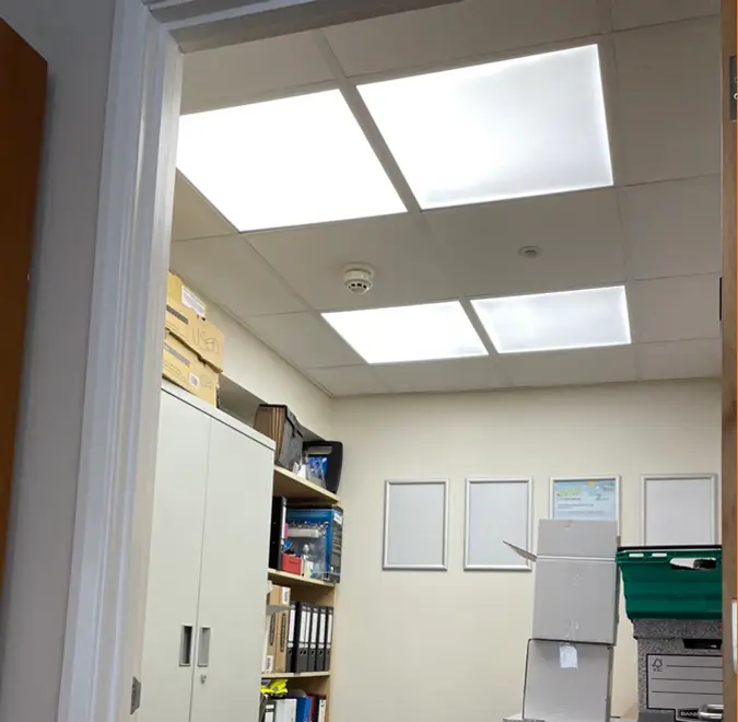After picture with bright white ceiling lights