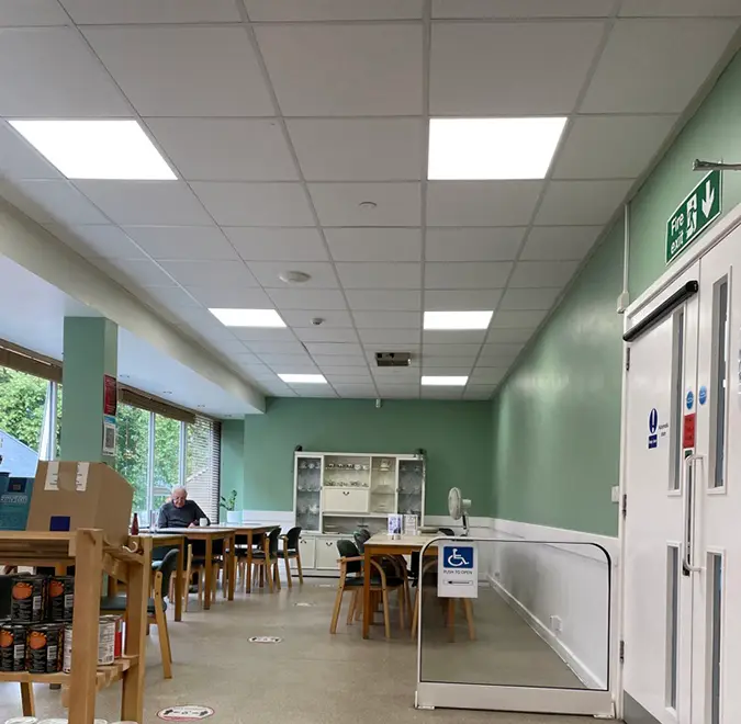 After picture with bright white ceiling lights