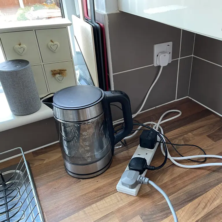 various appliances powered by an extension lead attached to a single plug socket
